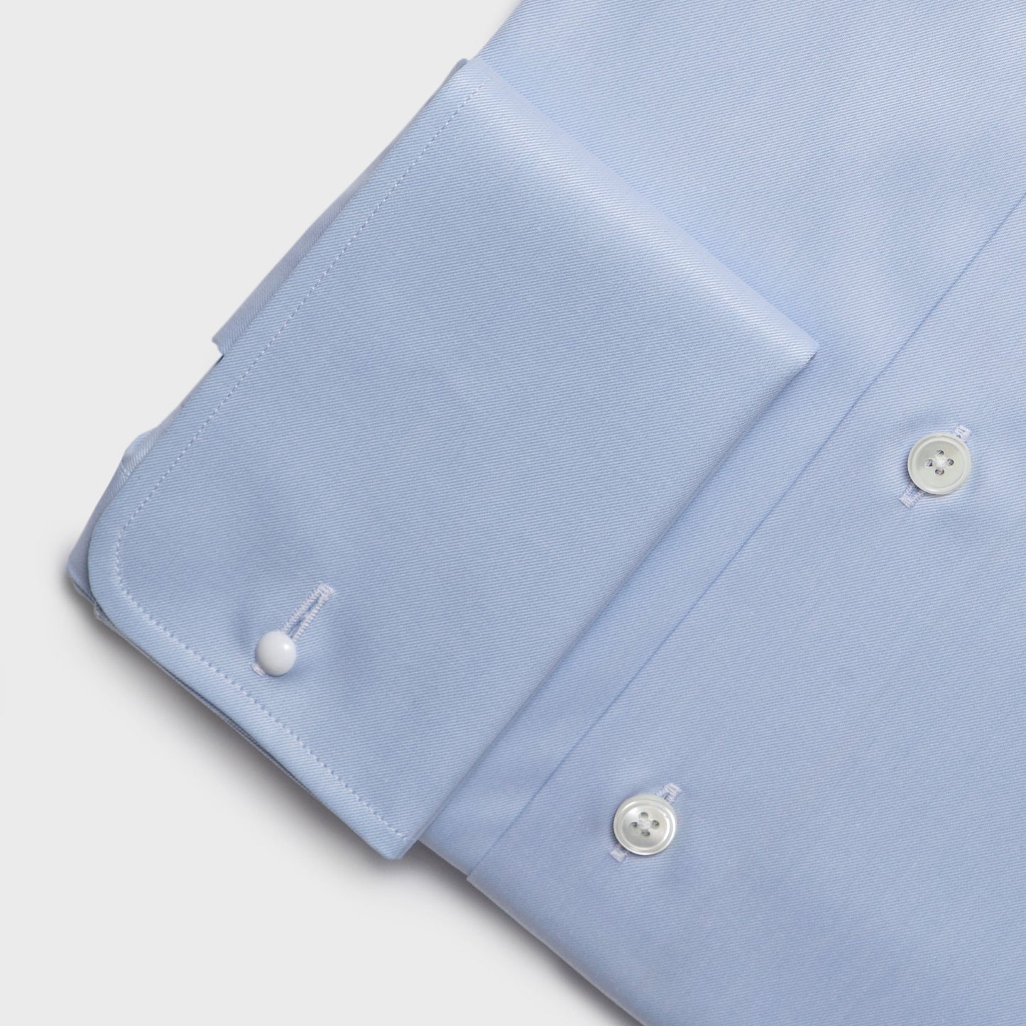 Blue cotton twill business shirt with round double cuffs